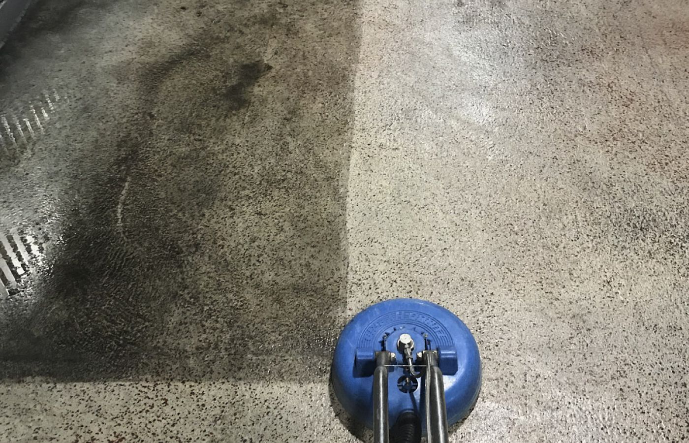 A Dirty Floor Inside A Building Being Cleaned With The Floor Cleaning Machine Showing A Visible Before And After Difference